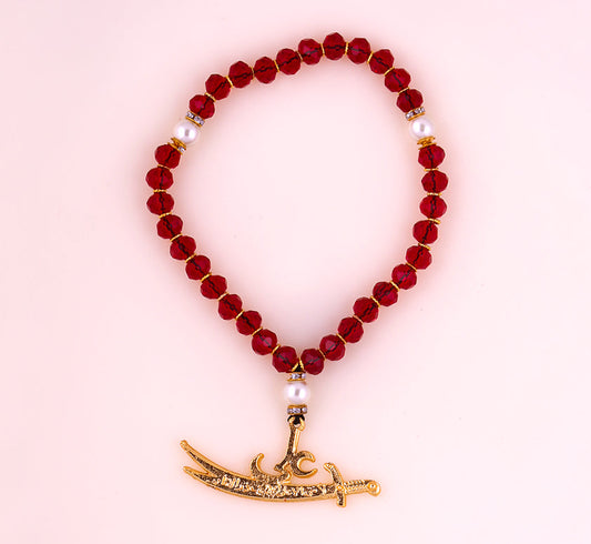 Divine Majesty Red Zircon Tasbeeh adorned with a Golden Pendant of Ya Ali (as) and Zulfiqar